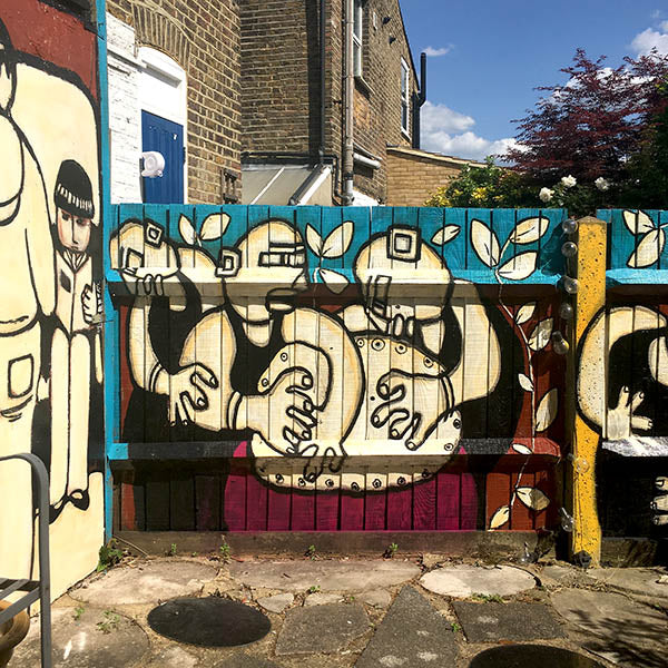 Drummers garden mural painting by ATADesigns — hand-painted with outdoor paint and Montana Gold spray paint