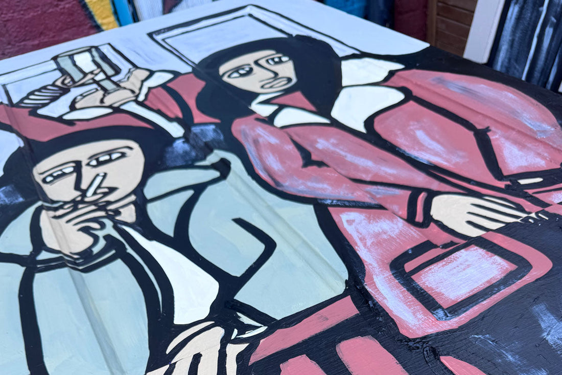 Garden mural design by Annette Taylor-Anderson of ATADesigns — bold figurative painting in rich colour with graphic black lines, painted on reclaimed wood in a garden.