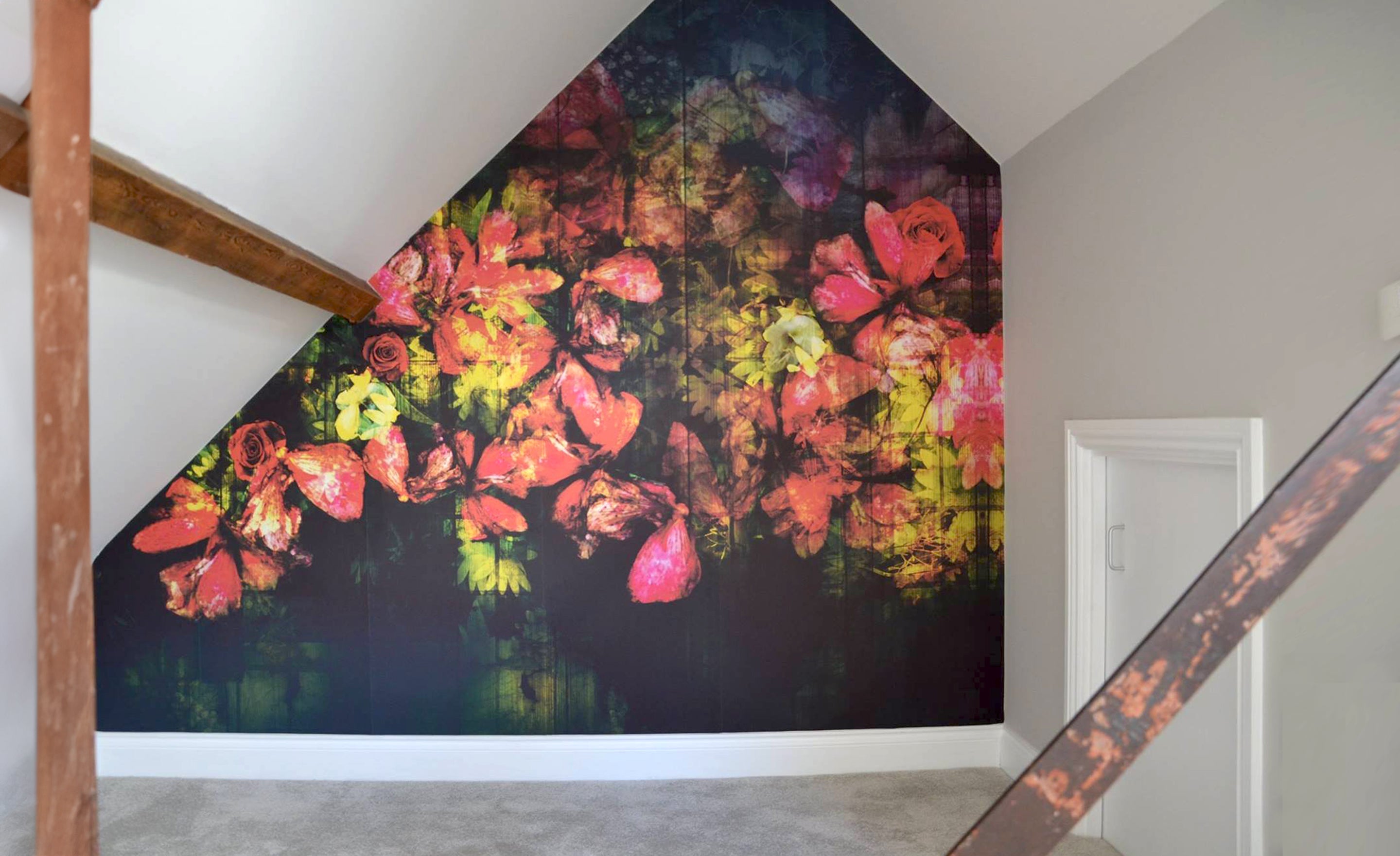 Regents Floral Expression Mural by ATADesigns. Feauring abstract pink and yellow flowers on dark background installed in loft room