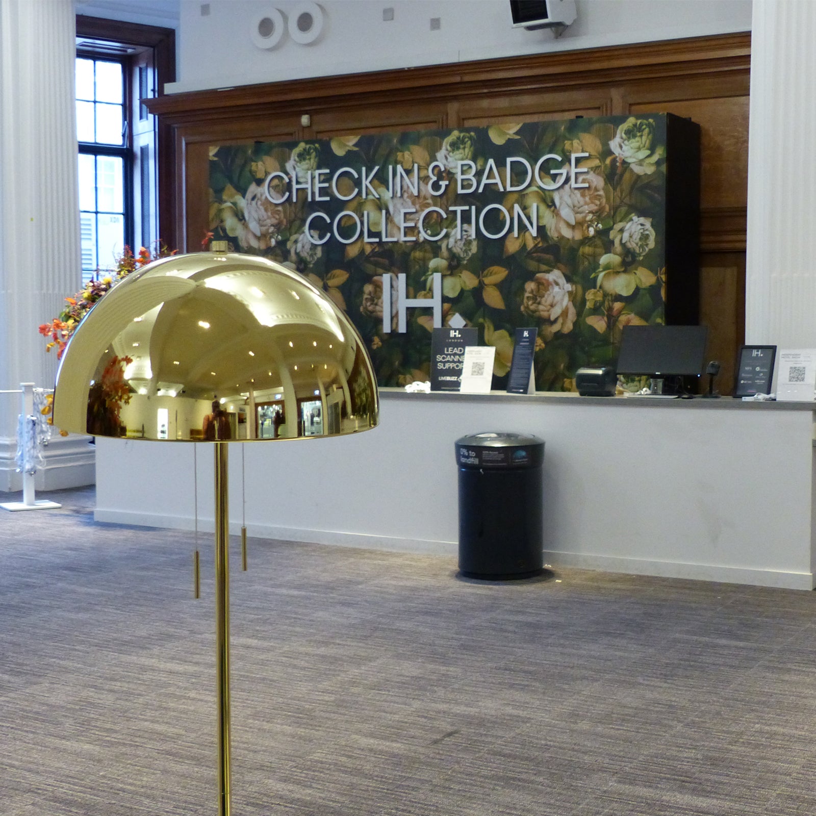 Kews Leafy Florals mural by ATADesigns at check in desk in the reception area at the Independent Hotel Show 2022