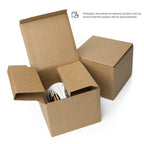 Cedric Art Deco mug in a cardboard box beside a closed box. Packaging varies by delivery location.