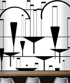 Chin Chin City Art Deco Mural design by ATADesigns. A modern black and white geometric wall mural featuring abstract arches, lines, and hanging bowl-like shapes, shown above a wooden counter with white chairs in the foreground.