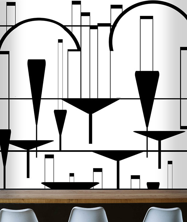 Chin Chin City Art Deco Mural design by ATADesigns. A modern black and white geometric wall mural featuring abstract arches, lines, and hanging bowl-like shapes, shown above a wooden counter with white chairs in the foreground.