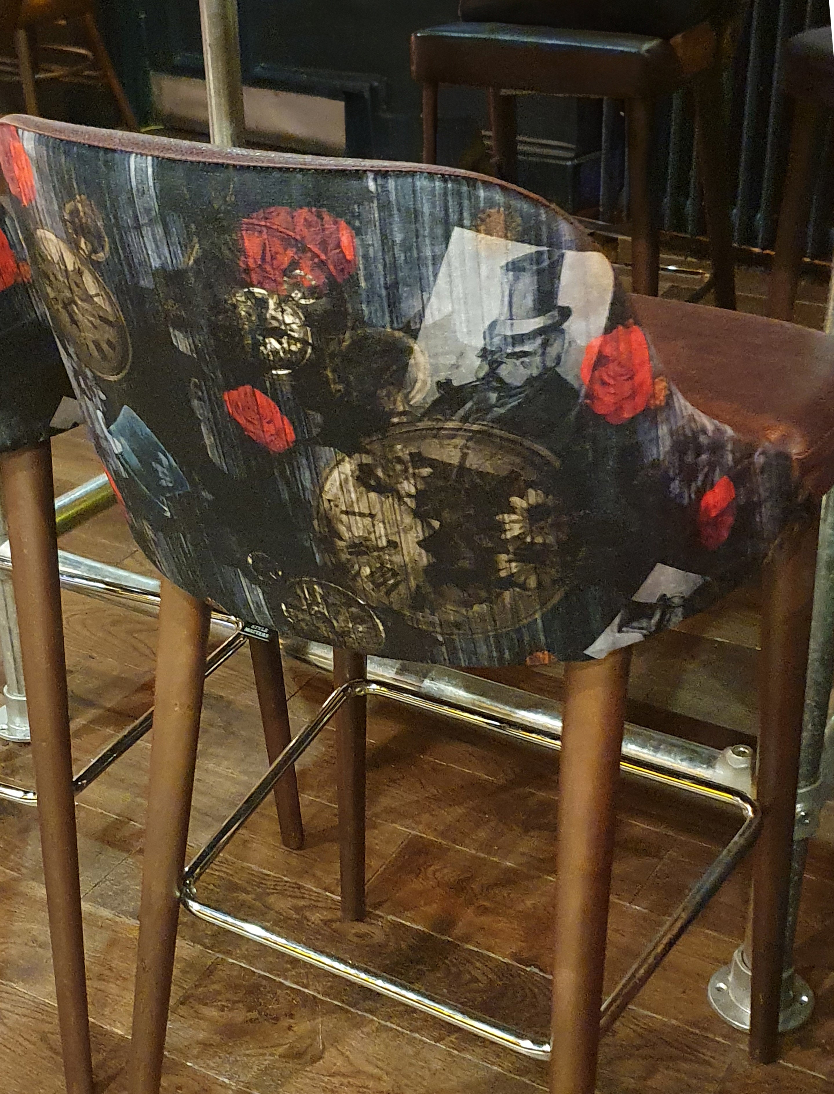 Dog N Wach fabric design by ATADesigns upholstered on bar stools