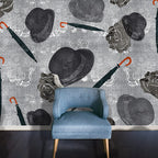 Edward Bowler mural design by ATADesigns.  This image features and chair in front of Edward Bowler mural featuring large dark and light grey bowler hats, roses illustration and floating grey umbrellas on illustration background with grey textures.