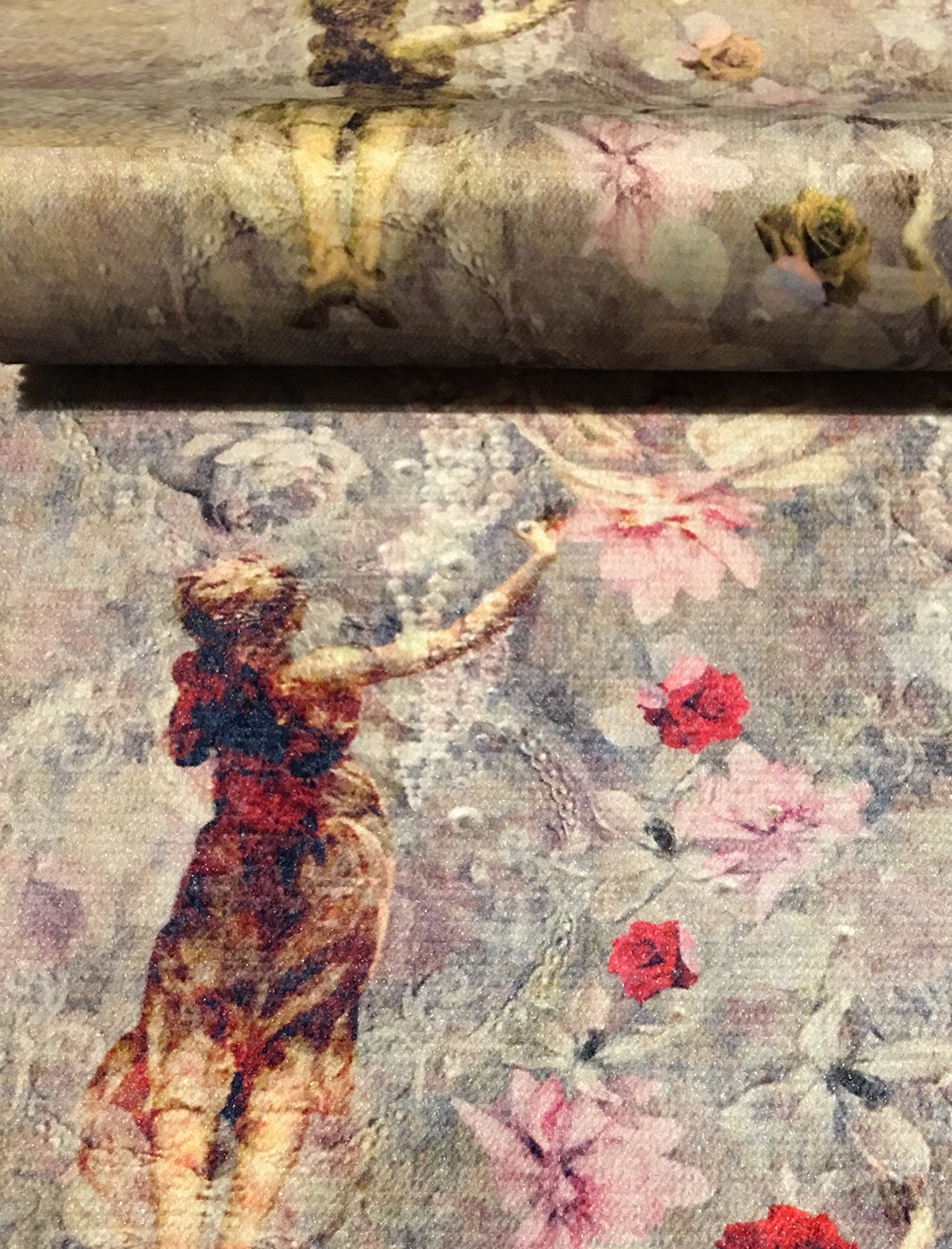 Close up of the Italian Infusion furnishing fabrics by ATADesigns and Elisa Interiors.  Featuring a lady wearing flowing dress among pearls and red and pink flowers on floral background.