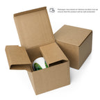 Pure Nature mug in a cardboard box beside a closed box. Packaging varies by delivery location.
