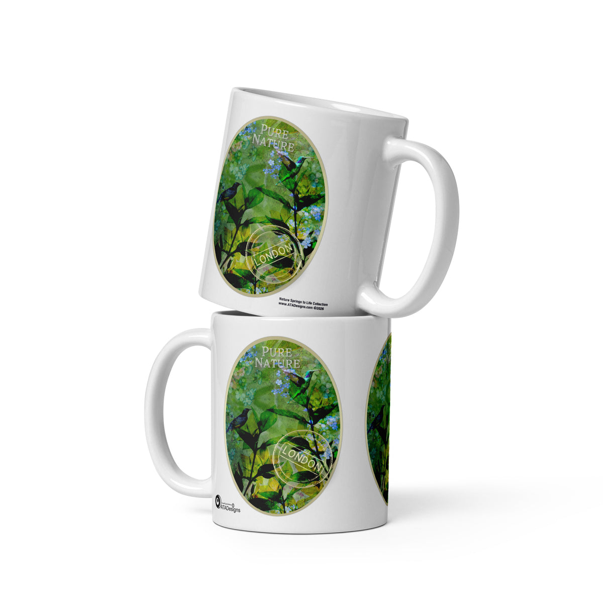 Two stacked Pure Nature mugs by ATADesigns, showing green botanical artwork with birds and blue flowers.