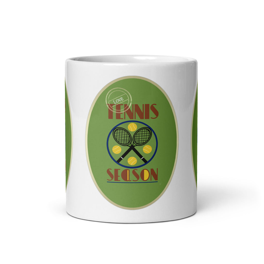 Front view of the Tennis Season mug, showing crossed black rackets and yellow balls beneath red “Tennis Season” lettering.