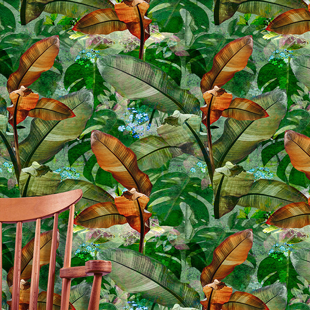 tropical leaves wallpaper design featuring large tropical leaves and small blue flowers in background