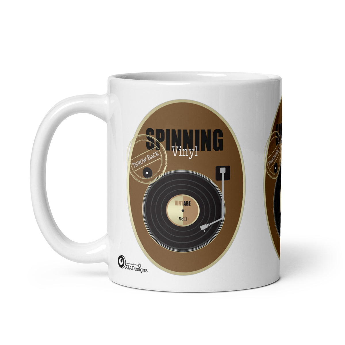 Vinyl Retro mug by ATADesigns with a black record on a brown background and “Spinning Vinyl” lettering, handle on the left.
